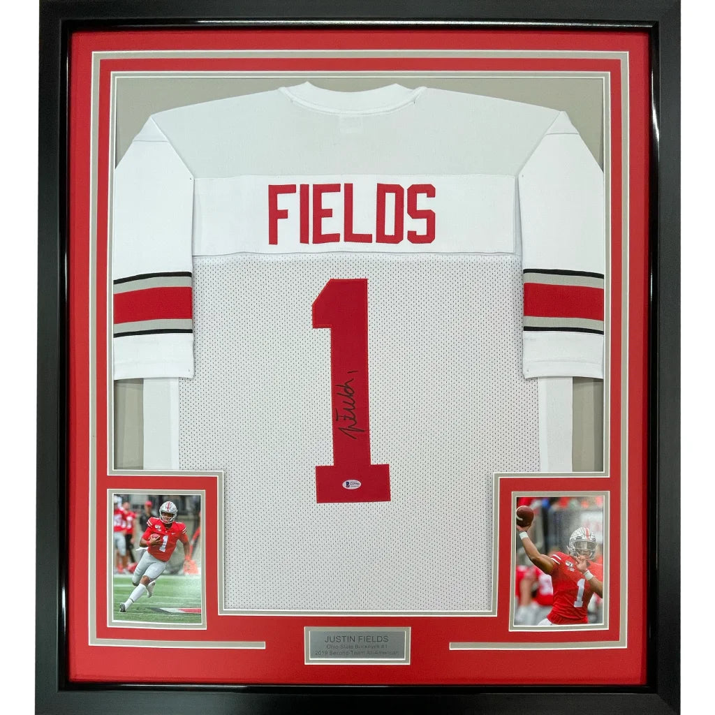 Framed autographed ohio state white and red football jersey with fields name and number 1 signed by justin fields