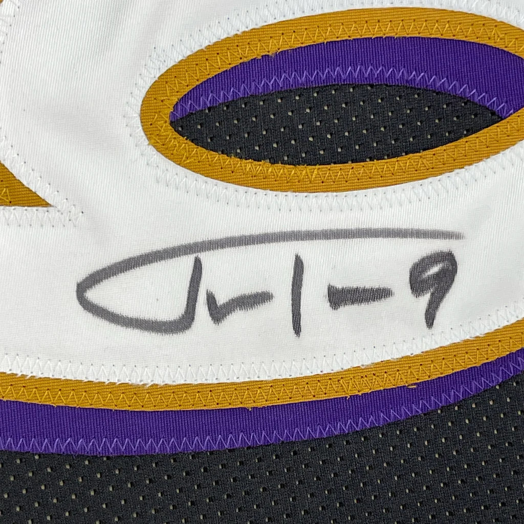 Framed autographed Justin Tucker Baltimore Ravens black football jersey with JSA COA
