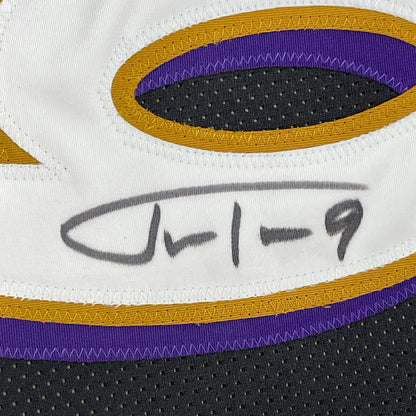 Framed autographed Justin Tucker Baltimore Ravens black football jersey with JSA COA
