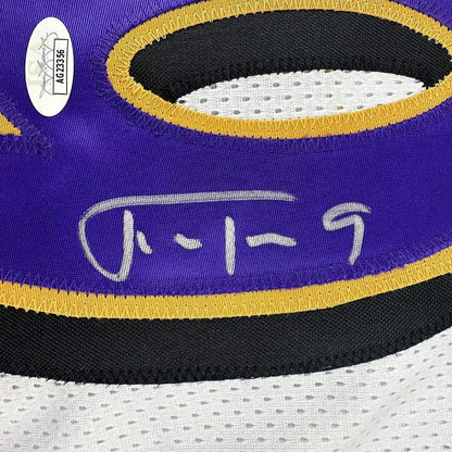 Purple and gold Signed Justin Tucker Ravens jersey with white signature and auth sticker