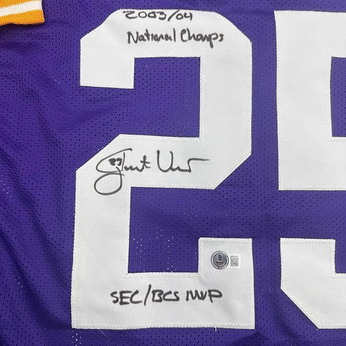 Framed autographed LSU purple jersey back with Shaun Alexander signed 20