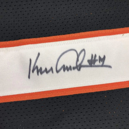 Black Bengals sports jersey with orange and white stripe and autograph for display