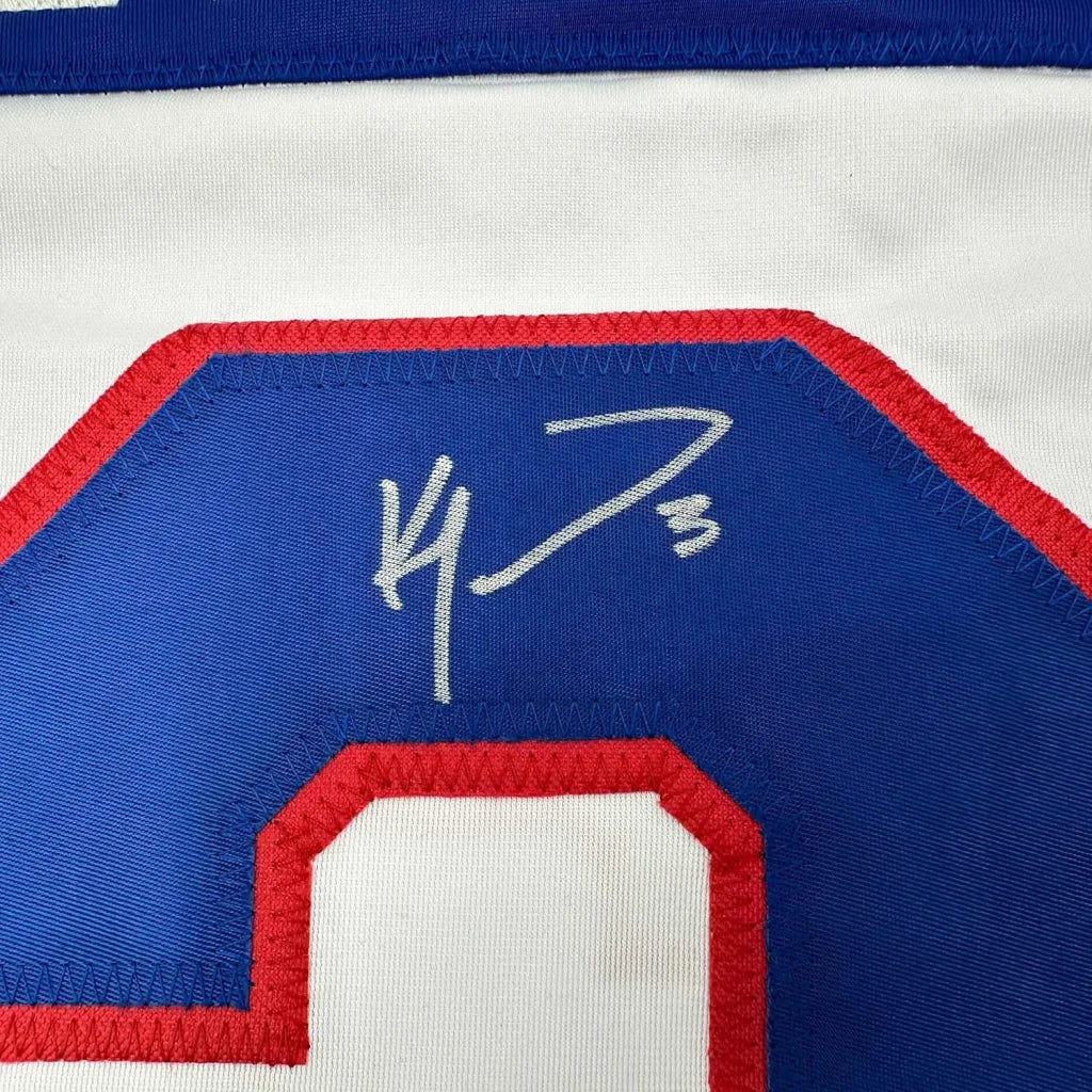Autographed Ken Morrow white hockey jersey with blue and red trim for hockey fans