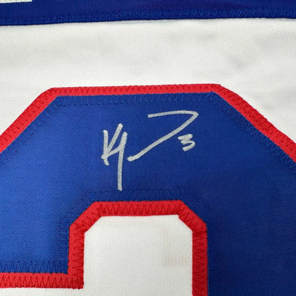 Autographed Ken Morrow white hockey jersey with blue and red trim for hockey fans