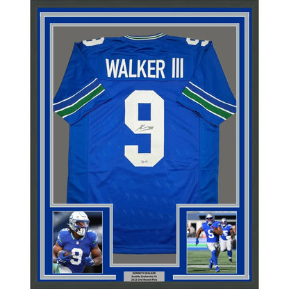Framed signed Seattle Seahawks football jersey with player photos ready to hang