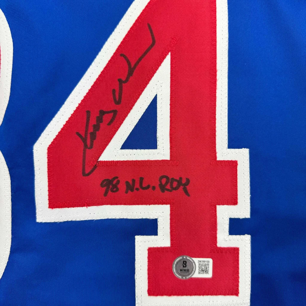 Framed Autographed Kerry Wood 98 ROY 35x39 Chicago Blue Baseball Jersey Beckett BAS COA | Certified Authentic Signed Memorabilia | vintageantiquesgifts.com