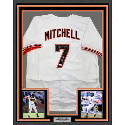 Framed autographed white san francisco baseball jersey with orange and black mitchell 7 lettering signed by kevin mitchell