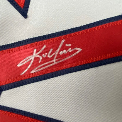 White fabric with red and blue trim and Kevin Youkilis signature for your man cave