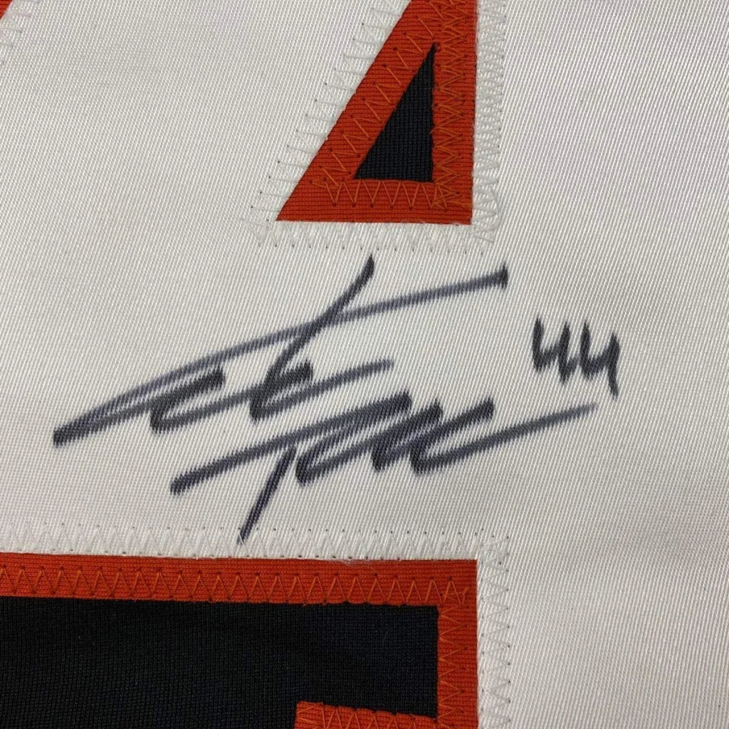 Framed autographed Kimmo Timonen Philadelphia Flyers jersey with black signature on white fabric and orange-black trim