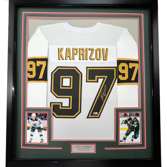 Framed autographed white hockey jersey with gold and black accents from Game Worn collection