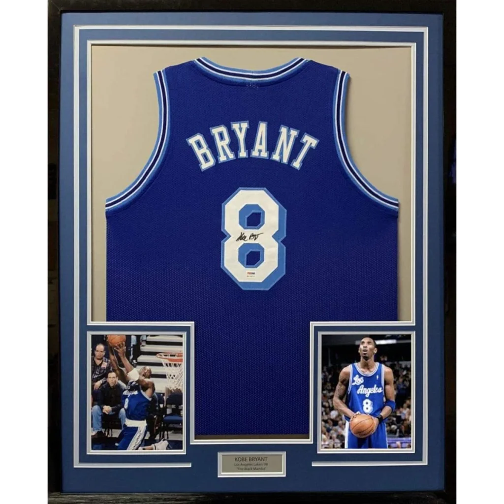 Professionally framed Kobe Bryant PSA DNA autographed Lakers jersey with player photos