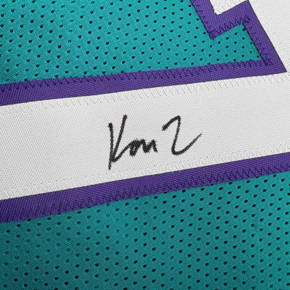 Framed Autographed Kon Knueppel 35x39 Charlotte Teal Basketball Jersey JSA COA | Certified Authentic Signed Memorabilia | vintageantiquesgifts.com