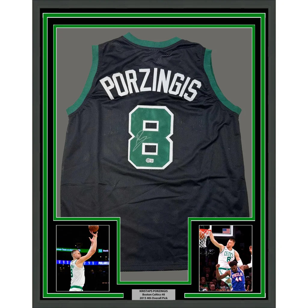 Framed autographed Kristaps Porzingis black basketball jersey with name and number 8