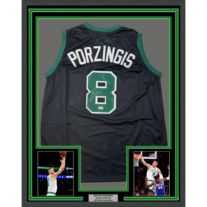 Framed autographed Kristaps Porzingis black basketball jersey with name and number 8