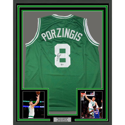 Professionally framed Kristaps Porzingis Boston Celtics green jersey with autographs and player photos