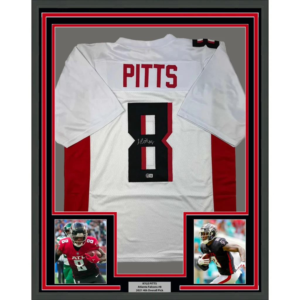 Framed autographed white and red atlanta falcons football jersey signed by kyle pitts with black number 8