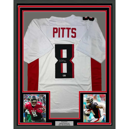 Framed autographed white and red atlanta falcons football jersey signed by kyle pitts with black number 8