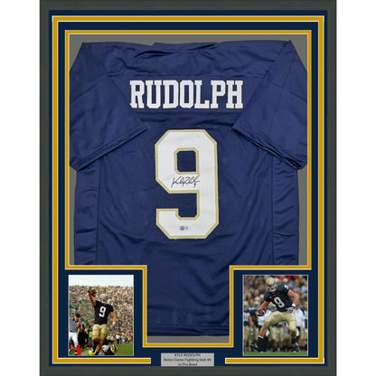 Autographed Blue Football Jersey with RUDOLPH 9, player pics, and info plaque