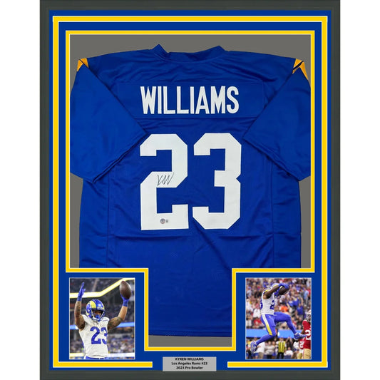 Autographed Blue Football Jersey with Player Photos in Frame Ready to Display