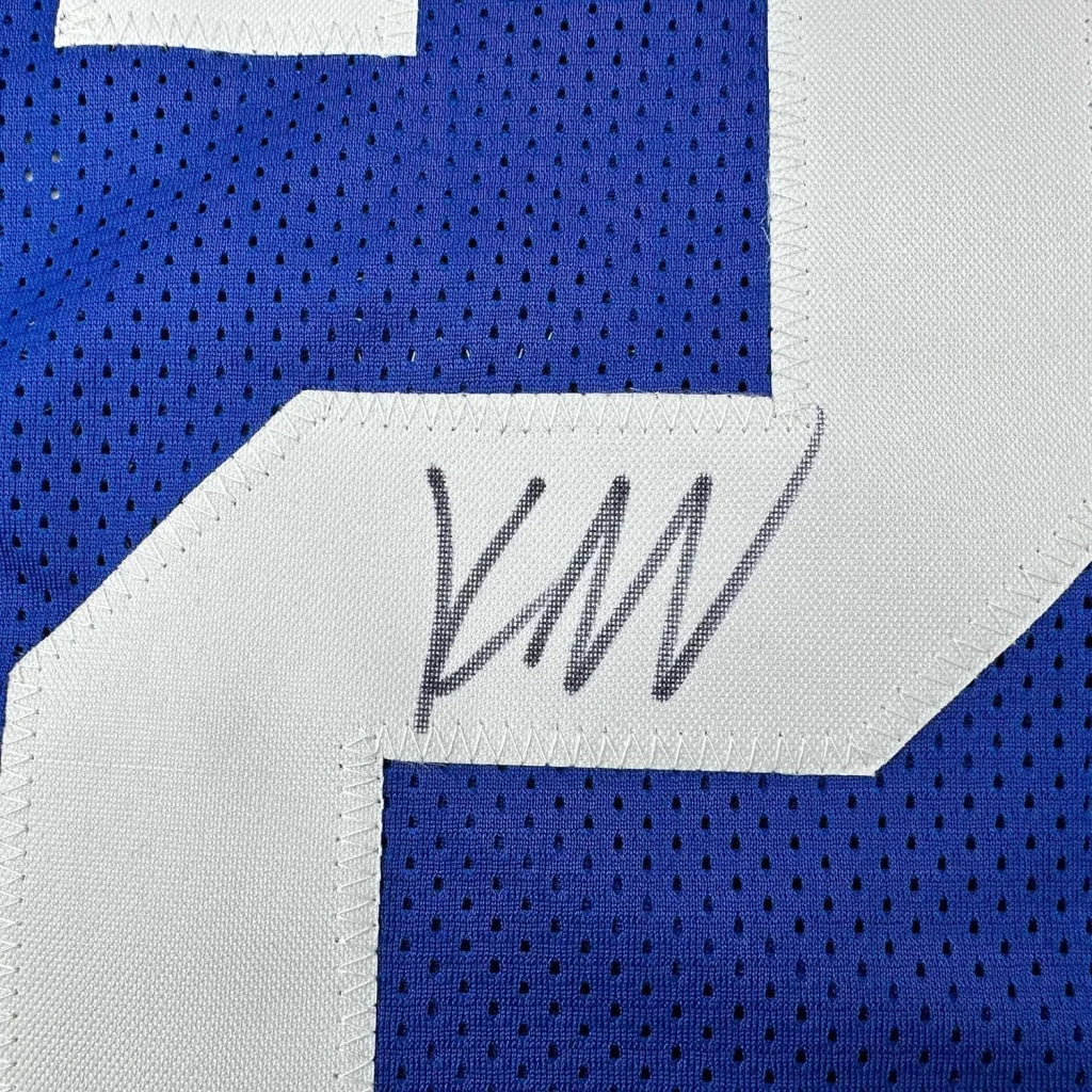 Autographed Blue Football Jersey with White Numbers and Photos Ready to Display