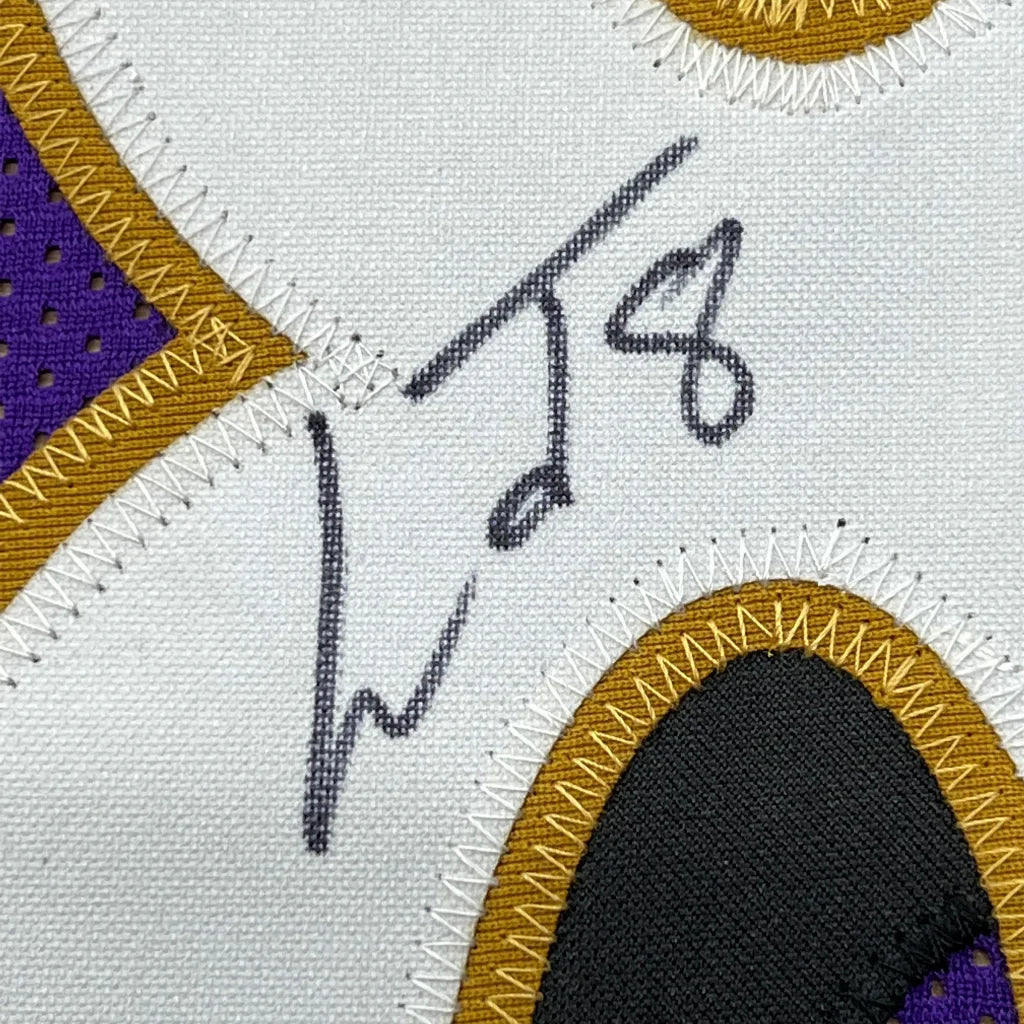 Framed autographed Lamar Jackson Baltimore Purple jersey with embroidered signature patch
