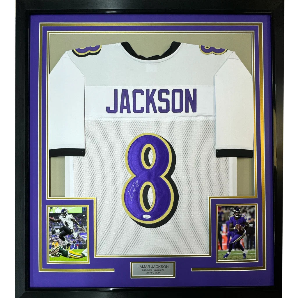 Framed autographed Lamar Jackson white Baltimore Ravens jersey with JSA COA
