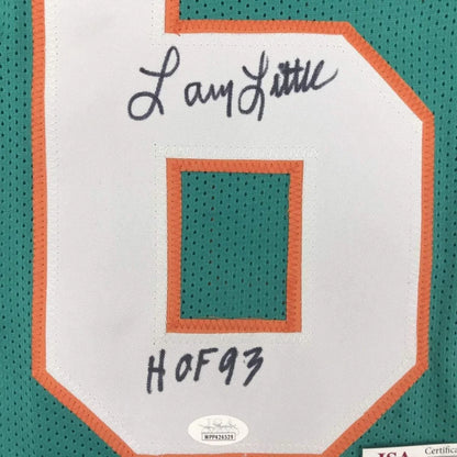Autographed Miami Dolphins #66 jersey in Hall of Fame display for Larry Little