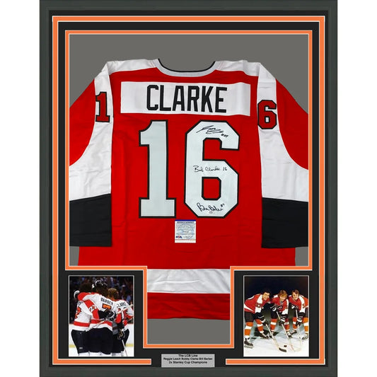 Framed Autographed LCB Line Reggie Leach, Bobby Clarke & Bill Barber 35x39 Philadelphia Orange Hockey Jersey JSA COA | Hall of Fame Sports Memorabilia | vintageantiquesgifts.com