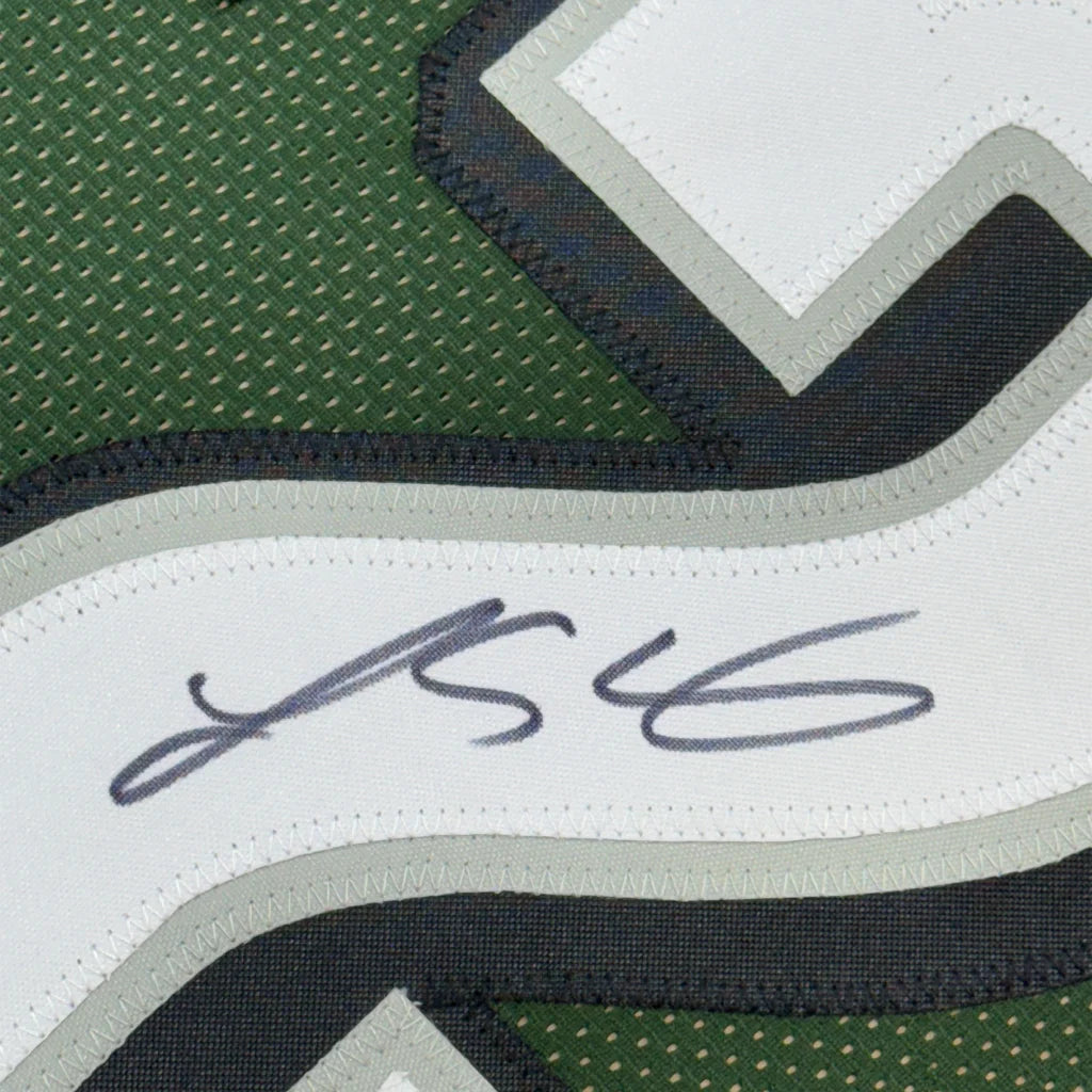 Autographed LeSean McCoy Eagles jersey in a professionally framed display with JSA COA