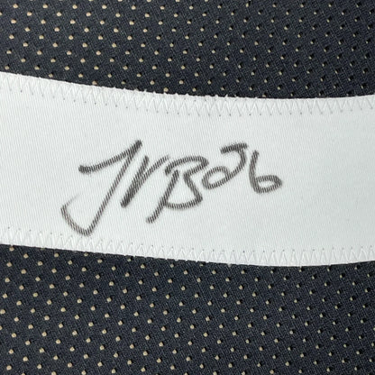 White fabric strip with Le’Veon Bell signature on black mesh for Steelers jersey display