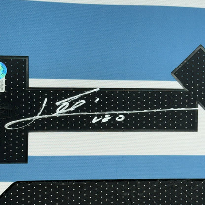 Black and white polka-dotted arrow art for perfect man cave with Lionel Messi jersey