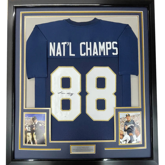Framed autographed lou holtz notre dame navy blue football jersey with white and gold natl champs lettering and number 88