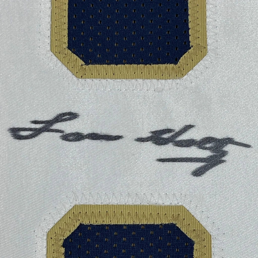 Framed autographed Notre Dame blue college football jersey with navy blue and gold mesh patch signed by Lonny