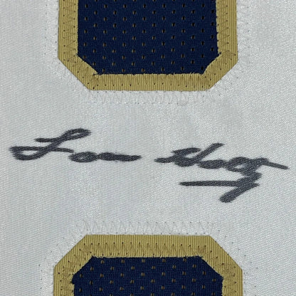Framed autographed Notre Dame blue college football jersey with navy blue and gold mesh patch signed by Lonny