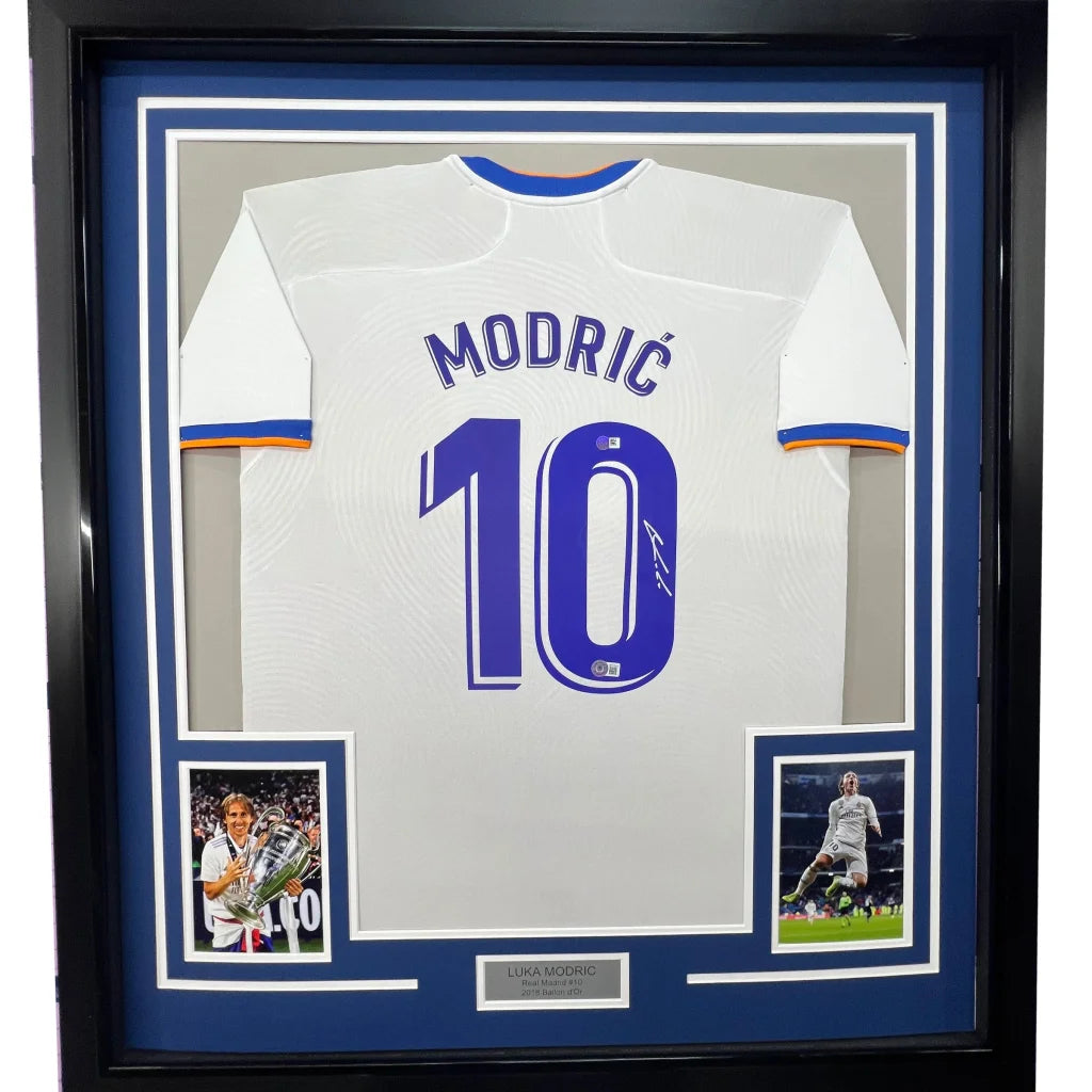 Framed white football jersey with MODRIĆ 10 on the back ready for display