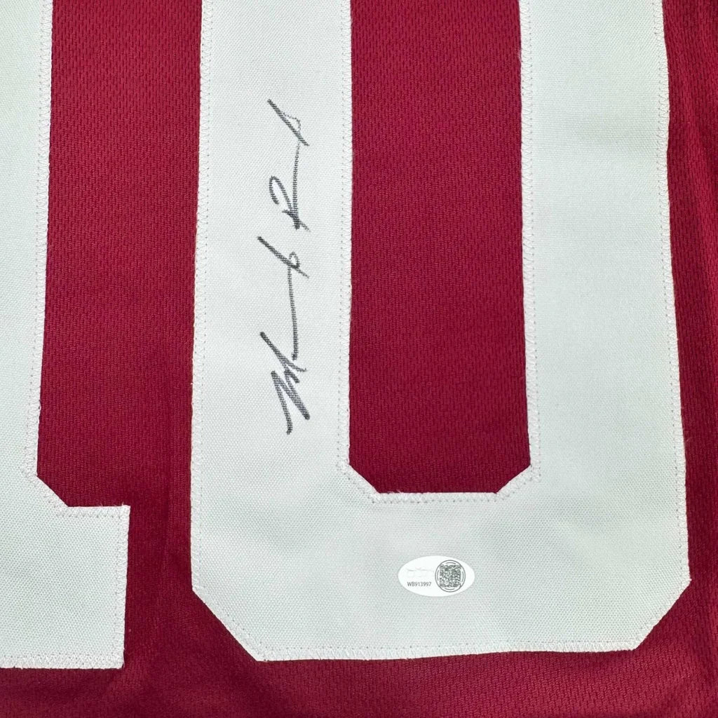 Back of framed autographed Marcel Reed Texas A&M maroon jersey with number 10
