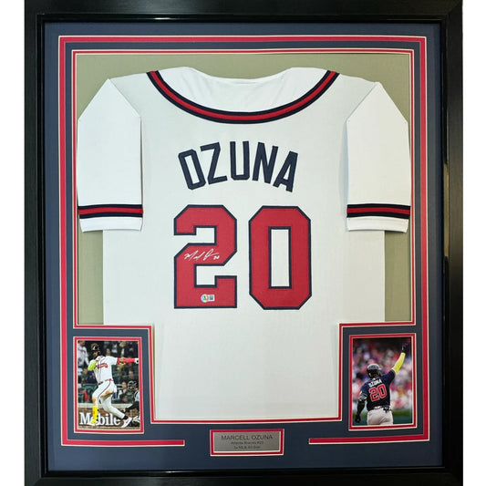 Framed Marcell Ozuna Signed Jersey with Player Photos for Your Man Cave Collection