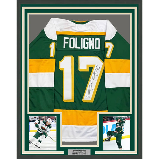 Green and yellow minnesota wild hockey jersey with white accents showing the back side with foligno 17 on the framed autograph