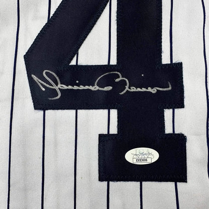 Autographed pinstriped Yankees jersey with Mariano Rivera signature, professionally framed