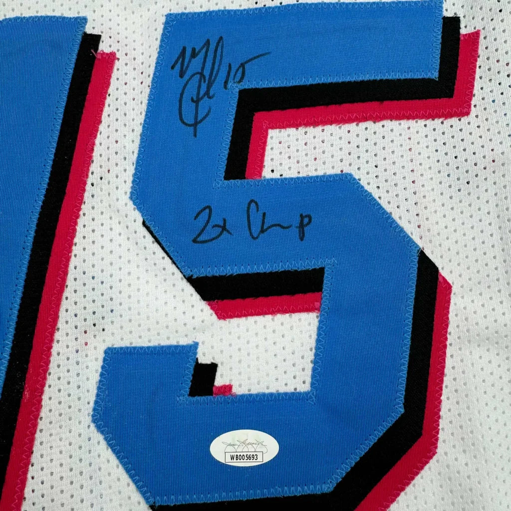 White Miami Heat jersey with blue and red number 5 and signatures, ready to display