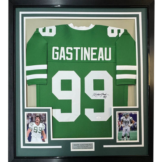 Framed Mark Gastineau Jets jersey with autographs, photos, and nameplate ready for wall display