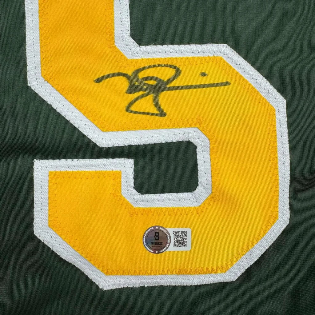 Framed autographed Mark McGwire yellow S Oakland green jersey Beckett BAS