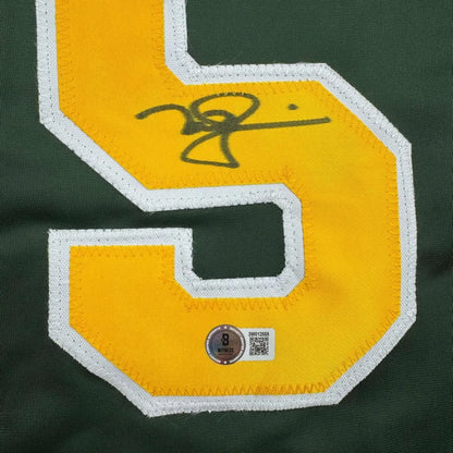 Framed autographed Mark McGwire yellow S Oakland green jersey Beckett BAS