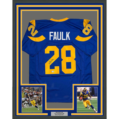 Framed Autographed Marshall Faulk 35x39 St. Louis Blue Football Jersey Beckett BAS COA | Hall of Fame Sports Memorabilia | vintageantiquesgifts.com