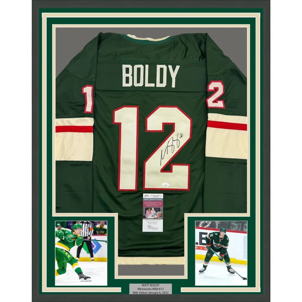 Framed Minnesota Wild autographed hockey jersey with photos and plaque for display