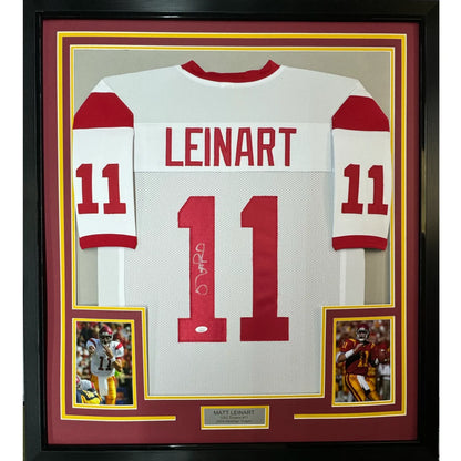 Framed signed Matt Leinart USC white jersey with Leinart 11, JSA COA