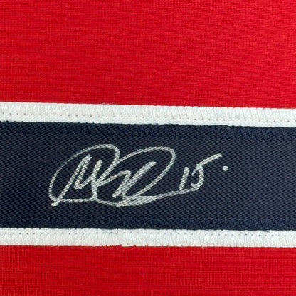 Red and navy blue striped USWNT jersey with white autograph, perfect for framing