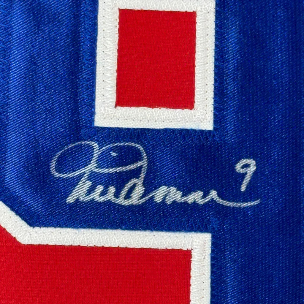 Autographed blue Mia Hamm Jersey with red and white accents ready to display
