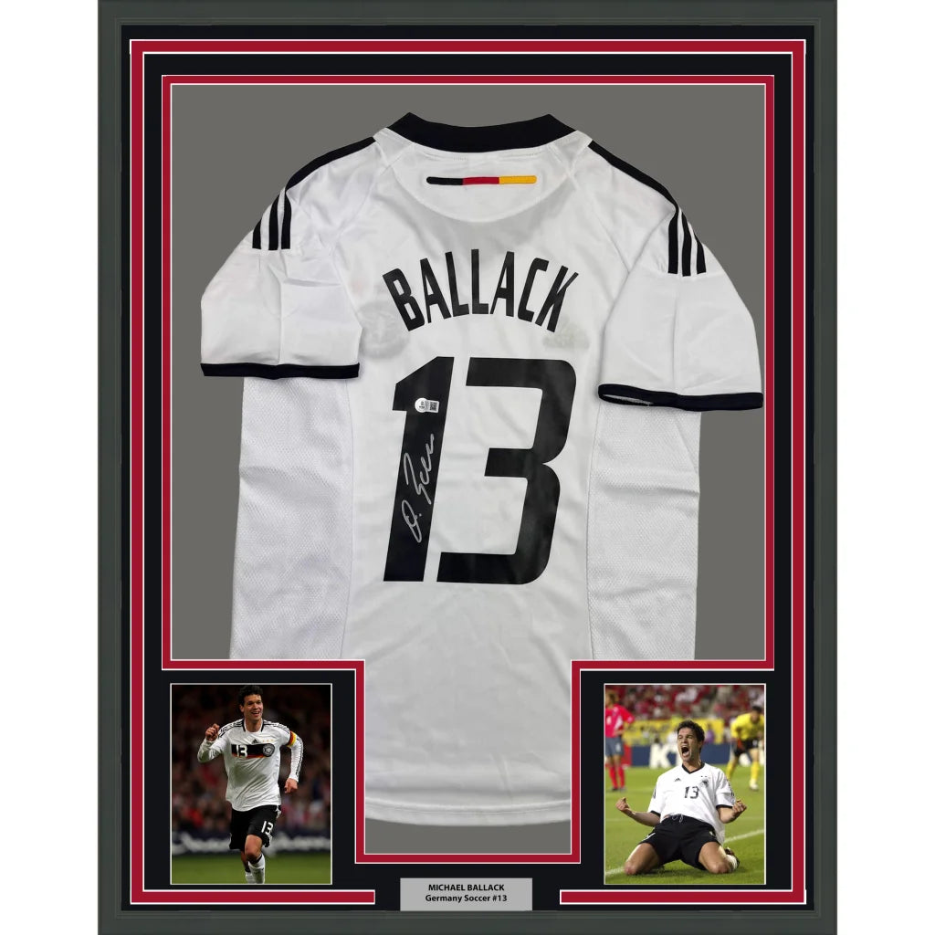 Back of framed autographed Michael Ballack Germany white soccer jersey with number 13 and Ballack name, Beckett BAS COA