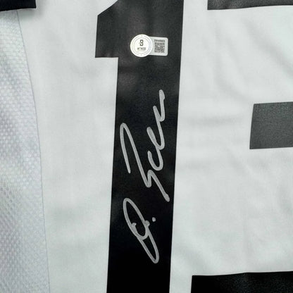 Back of framed autographed Michael Ballack Germany white soccer jersey with black number one, Beckett BAS COA